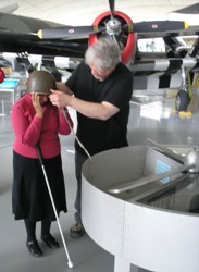 Working with handling objects during training at IWM Duxford. c.Vocaleyes