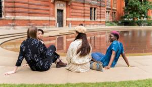 Young people sat outside the V&A