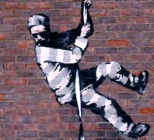 A still from the Banksy video shows the work