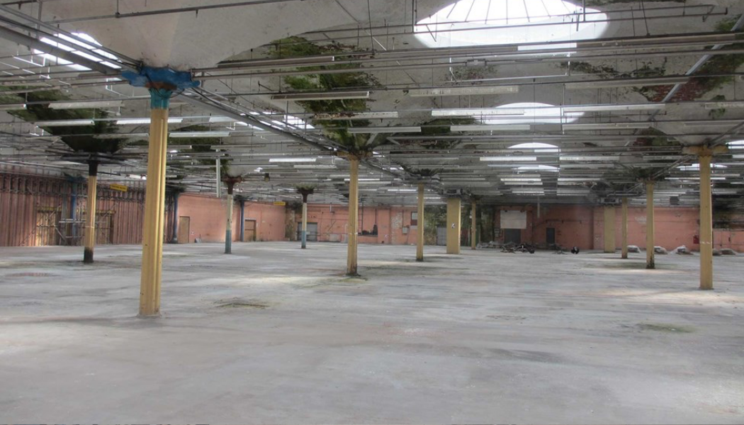 Interior of the former flax spinning mill; one of the first, large-scale single-storey factories, with vast brick-vaulted skylights