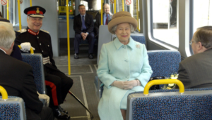 Queen Elizabeth II rides on the new Sunderland to Newcastle Metro Link after officially opening it. May 2002. (c) PA Images : Alamy Stock Photo