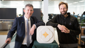 The unveiling of the stone carving at Benefact Group’s head office. Pictured is Mark Hews, Group Chief Executive of Benefact Group (left), and Ben Holmes, stonemason (right).