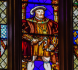 A stained glass of Henry VIII, one of the subjects of the film at Hampton Court.
