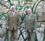 Gilbert & George at the gates to The Gilbert & George Centre Photograph- Yu Yigang © Gilbert & George