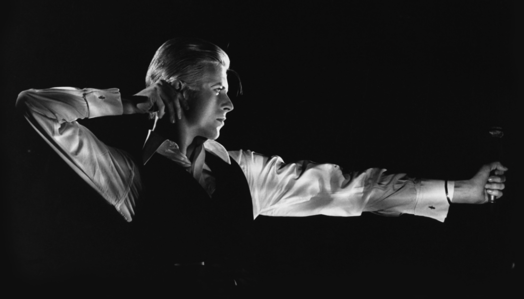 Photograph of David Bowie Performing as The Thin White Duke on the Station to Station tour, 1976. Photograph by John Robert Rowlands. © John Robert Rowlands and The David Bowie Archive