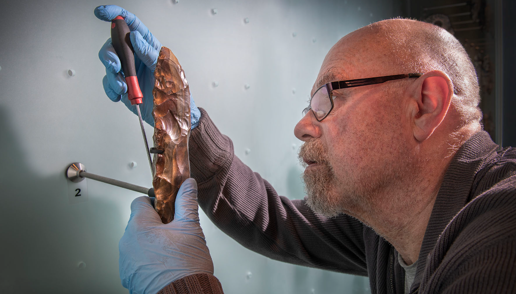 Museum of London staff remove flint tranchet adze (c Museum of London